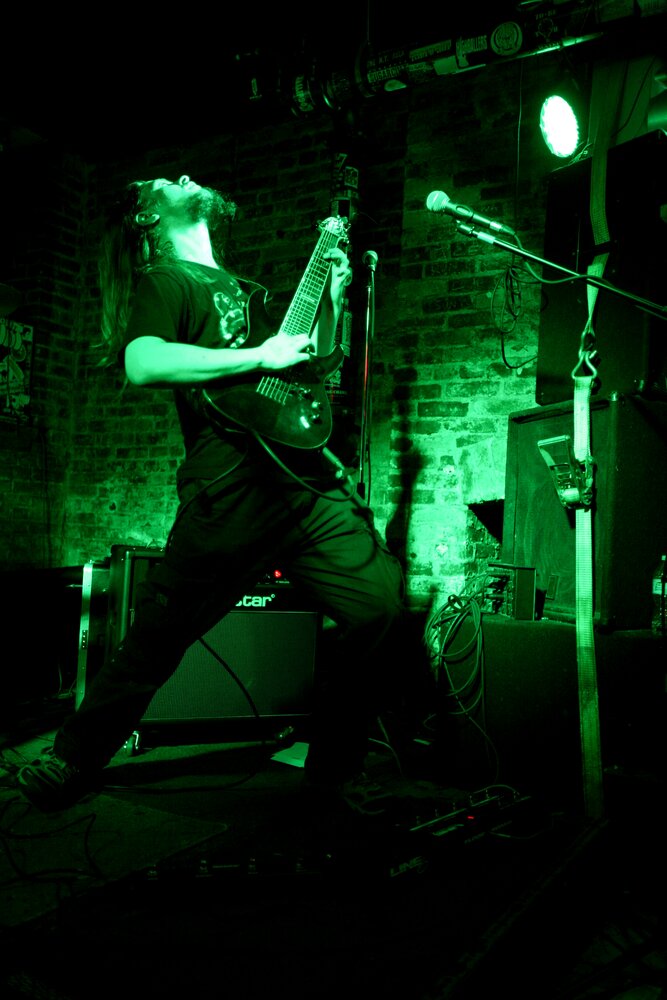 Pete Lesko performing guitar